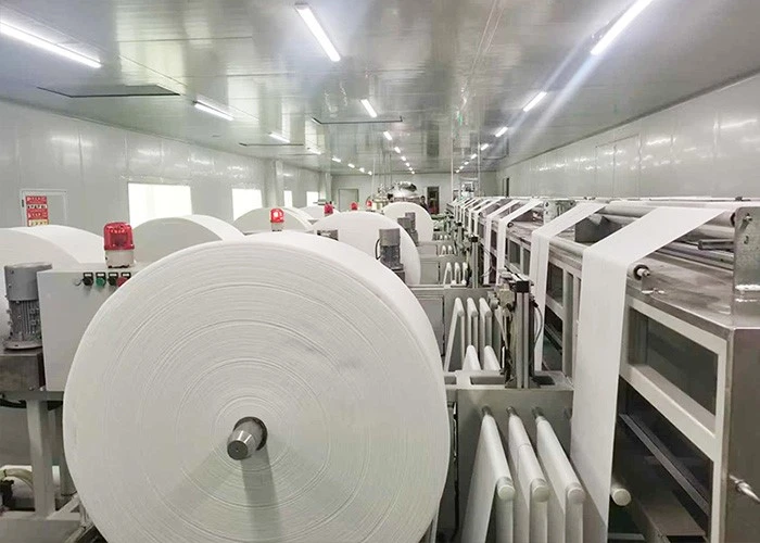 Automated paper product converting line